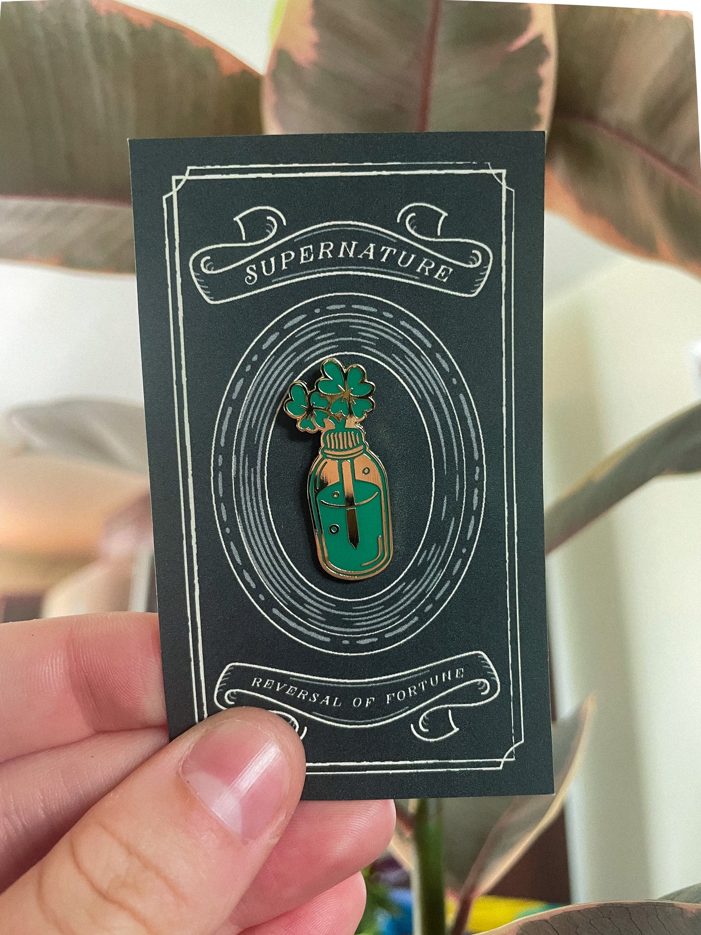 Reversal of Fortune Enamel Pin